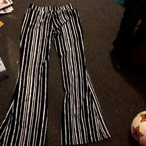 Black and white striped flared leggings. Shosho size small